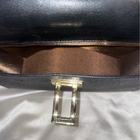 Elegant Black Handbag with Gold Accents - Picture 3 of 6